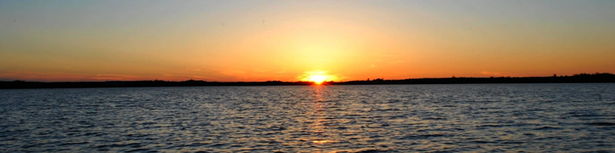 Sunset over a calm lake
